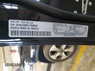 2020 Jeep Compass Latitude with VIN 3C4NJDBB3LT258349, listed as a Copart auction lot 61452715 with 80,933 mi miles and Salvage title. Bid and sale history available at DreamBid. Image 13.