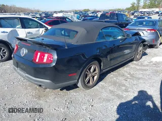 2011 Ford Mustang V6 with VIN 1ZVBP8EM7B5129385, listed as a IAAI auction lot 41208300 with 56,429 mi miles and . Bid and sale history available at DreamBid. Image 4.