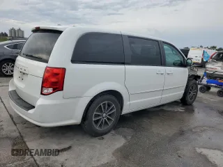 2015 Dodge Grand Caravan American Value with VIN 2C4RDGBG0FR636219, listed as a Copart auction lot 54527235 with 95,175 mi miles and Salvage Title. Bid and sale history available at DreamBid. Image 3.