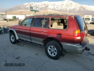 1999 Mitsubishi Montero Sport LS with VIN JA4MT31H2XP002911, listed as a Copart auction lot 89133235 with 209,624 mi miles and Salvage Title. Bid and sale history available at carsss.com. Image 2.