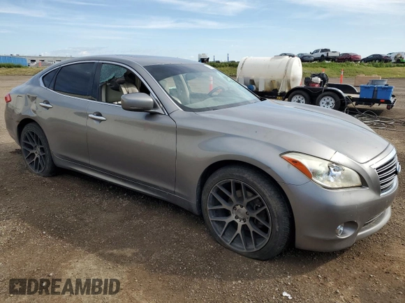 2011 Infiniti M with VIN JN1BY1ARXBM370844, listed as a Copart auction lot 62425515 with 277,315 mi miles and Salvage title. Bid and sale history available at DreamBid. Image 4.