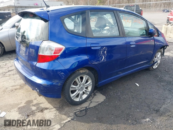 2009 Honda Fit Sport with VIN JHMGE88459S053654, listed as a IAAI auction lot 42036062 with 190,246 mi miles. Bid and sale history available at carsss.com. Image 4.