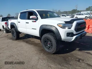 2016 Toyota Tacoma SR with VIN 5TFCZ5AN4GX007514, listed as a IAAI auction lot 41737871 with 82,135 mi miles and . Bid and sale history available at DreamBid. Image 1.