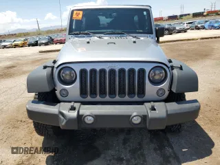 2014 Jeep Wrangler Unlimited Rubicon with VIN 1C4HJWFG1EL241014, listed as a Copart auction lot 63948655 with 165,650 mi miles and Salvage title. Bid and sale history available at DreamBid. Image 5.