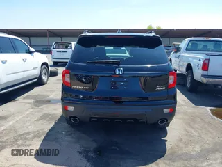 2021 Honda Passport Elite with VIN 5FNYF8H07MB003506, listed as a IAAI auction lot 42571906 with 42,323 mi miles and . Bid and sale history available at DreamBid. Image 17.