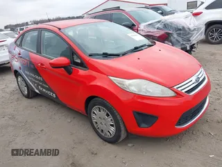 2012 Ford Fiesta SE z VIN 3FADP4BJXCM100088, wystawiony jako IAAI lot #41166661 z przebiegiem 121 931 mil mil oraz . Historia ofert i sprzedaży dostępna na DreamBid. Obrazek 1.
