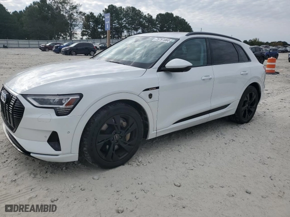 2021 Audi e-tron Premium with VIN WA1AAAGEXMB012122, listed as a Copart auction lot 75797084 with 27,971 mi miles and Salvage Title. Bid and sale history available at carsss.com. Image 1.