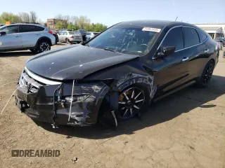2011 Honda Crosstour EX-L z VIN 5J6TF2H59BL003613, wystawiony jako Copart lot #54967035 z przebiegiem 130 880 mil mil oraz Szkoda całkowita • Salvage title. Historia ofert i sprzedaży dostępna na DreamBid. Obrazek 1.