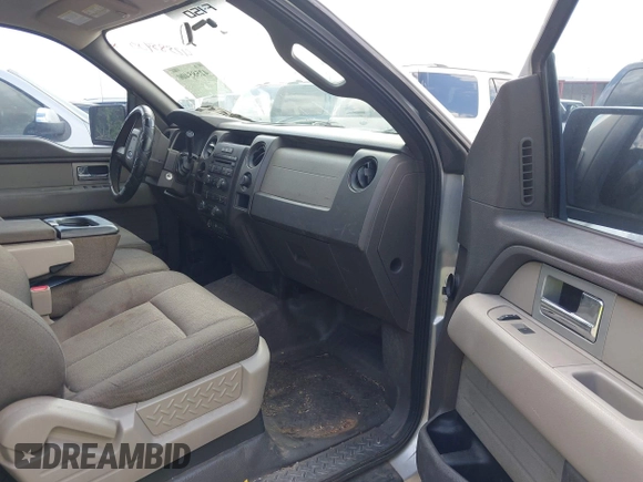 2009 Ford F-150 STX with VIN 1FTRX12W59FB48648, listed as a IAAI auction lot 42585400 with 194,483 mi miles and . Bid and sale history available at DreamBid. Image 5.