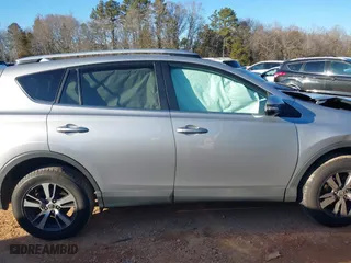 2016 Toyota RAV4 XLE with VIN 2T3WFREV0GW282440, listed as a IAAI auction lot 41293586 with 71,723 mi miles. Bid and sale history available at carsss.com. Image 13.