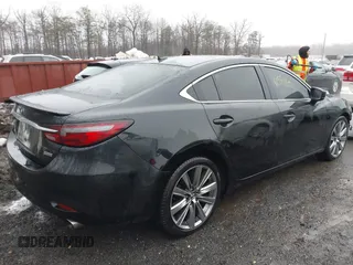 2018 Mazda 6 Grand Touring Reserve with VIN JM1GL1WY1J1308749, listed as a IAAI auction lot 41571220 with 113,041 mi miles and . Bid and sale history available at carsss.com. Image 4.