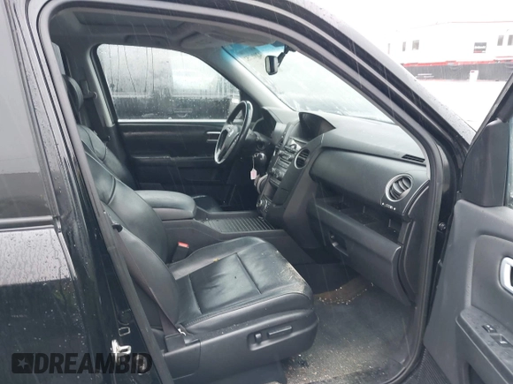 2014 Honda Pilot Touring with VIN 5FNYF4H91EB055741, listed as a IAAI auction lot 42006752 with 222,308 mi miles and . Bid and sale history available at carsss.com. Image 5.