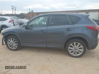 2013 Mazda CX-5 Grand Touring with VIN JM3KE4DE2D0164225, listed as a IAAI auction lot 41663412 with 162,738 mi miles. Bid and sale history available at carsss.com. Image 14.