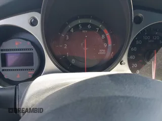 2013 Nissan 370Z z VIN JN1AZ4EH8DM880849, wystawiony jako IAAI lot #42131189 z przebiegiem Nie podano mil oraz . Historia ofert i sprzedaży dostępna na DreamBid. Obrazek 7.