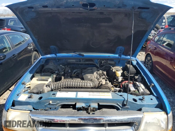 1999 Ford Ranger XLT with VIN 1FTYR10X0XUA52307, listed as a Copart auction lot 50044505 with 94,457 mi miles and Salvage title. Bid and sale history available at DreamBid. Image 11.