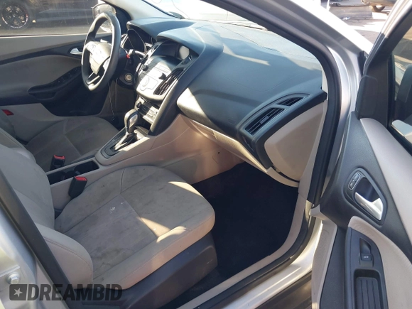 2018 Ford Focus SE z VIN 1FADP3F27JL204873, wystawiony jako IAAI lot #41657504 z przebiegiem 99 224 mil mil oraz . Historia ofert i sprzedaży dostępna na DreamBid. Obrazek 5.