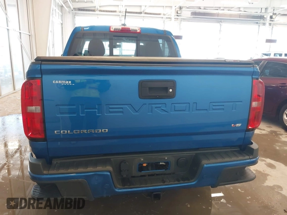 2021 Chevrolet Colorado 4WD Z71 with VIN 1GCGTDEN7M1141049, listed as a IAAI auction lot 41223962 with 62,114 mi miles and . Bid and sale history available at DreamBid. Image 16.
