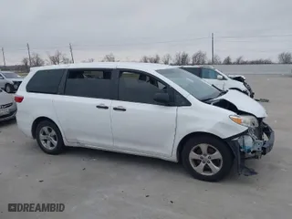 2015 Toyota Sienna L with VIN 5TDZK3DC5FS675095, listed as a IAAI auction lot 41434418 with 124,630 mi miles. Bid and sale history available at carsss.com. Image 13.