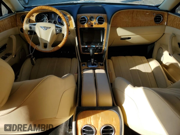 2014 Bentley Flying Spur z VIN SCBEC9ZA2EC090466, wystawiony jako Copart lot #43833305 z przebiegiem 53 837 mil mil oraz Szkody całkowita. Historia ofert i sprzedaży dostępna na DreamBid. Obrazek 8.