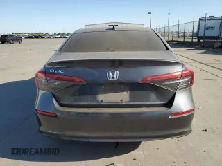 2022 Honda Civic LX z VIN 2HGFE2F26NH517811, wystawiony jako Copart lot #52933645 z przebiegiem Nie podano mil oraz Szkoda całkowita • Salvage title. Historia ofert i sprzedaży dostępna na DreamBid. Obrazek 6.