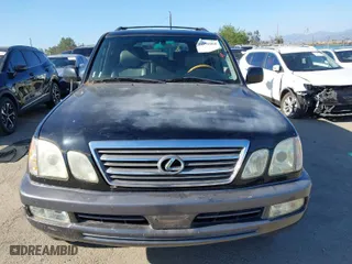 2004 Lexus LX 470 with VIN JTJHT00WX43543307, listed as a IAAI auction lot 41996860 with 211,652 mi miles. Bid and sale history available at carsss.com. Image 13.