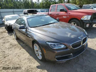 2015 BMW 6 Series 640i with VIN WBA6A0C54FD318961, listed as a Copart auction lot 59822782 with 144,077 mi miles. Bid and sale history available at carsss.com. Image 1.