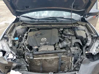 2014 Mazda CX-5 Touring z VIN JM3KE2CY7E0308580, wystawiony jako Copart lot #60565835 z przebiegiem 92 708 mil mil oraz Szkoda całkowita • Salvage title. Historia ofert i sprzedaży dostępna na DreamBid. Obrazek 12.