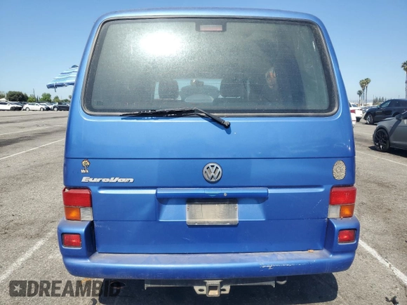 2003 Volkswagen EuroVan с VIN WV2KB470X3H028721, выставлен на аукционе Copart как лот 57531425 с пробегом 233 629 миль миль и Чистый • Clean title. История ставок и продаж доступна на DreamBid. Изображение 6.