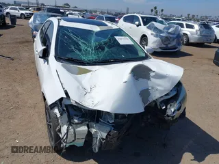 2014 Toyota Corolla L with VIN 5YFBURHE7EP049355, listed as a IAAI auction lot 42073330 with 129,605 mi miles and . Bid and sale history available at DreamBid. Image 6.