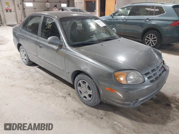 2004 Hyundai Accent GL with VIN KMHCG45C44U528783, listed as a IAAI auction lot 41535104 with 1 mi miles. Bid and sale history available at carsss.com. Image 1.