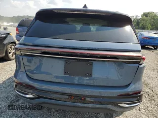 2025 Lincoln Nautilus z VIN 5LMPJ9J49SJ900032, wystawiony jako Copart lot #59480565 z przebiegiem 1 860 mil mil oraz Szkoda całkowita • Salvage title. Historia ofert i sprzedaży dostępna na DreamBid. Obrazek 6.