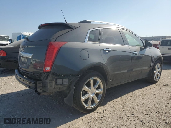 2013 Cadillac SRX Premium Collection with VIN 3GYFNJE37DS531306, listed as a Copart auction lot 52613645 with 20,594 mi miles and Salvage title. Bid and sale history available at DreamBid. Image 3.