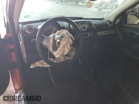 2013 Smart fortwo Pure with VIN WMEEJ3BA2DK663995, listed as a Copart auction lot 54629895 with Not Provided miles and Salvage Title. Bid and sale history available at DreamBid. Image 8.