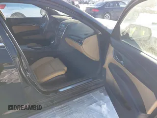 2014 Cadillac ATS Standard AWD with VIN 1G6AG5RX1E0170228, listed as a IAAI auction lot 41629063 with 89,568 mi miles and . Bid and sale history available at DreamBid. Image 5.
