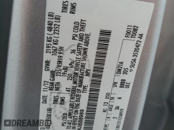 2013 Ford Escape Titanium with VIN 1FMCU9J9XDUB88989, listed as a Copart auction lot 64994445 with 192,833 mi miles and Salvage title. Bid and sale history available at DreamBid. Image 12.