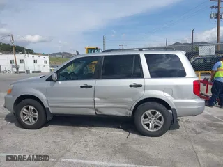 2005 Honda Pilot EX-L with NAVI with VIN 2HKYF18755H552502, listed as a IAAI auction lot 41921122 with 187,904 mi miles. Bid and sale history available at carsss.com. Image 14.