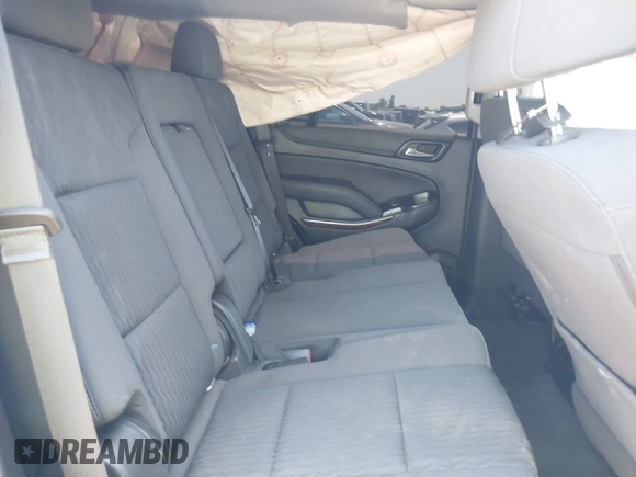 2020 Chevrolet Tahoe LS with VIN 1GNSCAKCXLR293278, listed as a IAAI auction lot 41973191 with 61,907 mi miles and . Bid and sale history available at DreamBid. Image 8.