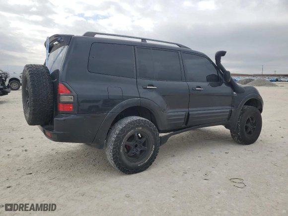 2001 Mitsubishi Montero XLS with VIN JA4MW31R51J036660, listed as a Copart auction lot 86295014 with 271702 miles and Salvage Title. Bid and sale history available at carsss.com. Image 3.