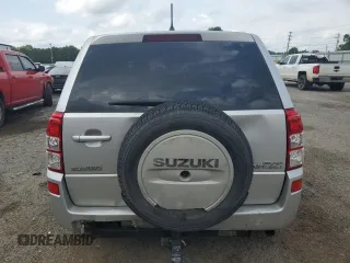 2006 Suzuki Grand Vitara z VIN JS3TE941764101657, wystawiony jako Copart lot #54943205 z przebiegiem 206 744 mil mil oraz Szkody całkowita. Historia ofert i sprzedaży dostępna na DreamBid. Obrazek 6.