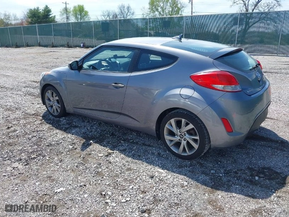 2017 Hyundai Veloster with VIN KMHTC6AD8HU305853, listed as a IAAI auction lot 41915404 with 115,663 mi miles. Bid and sale history available at carsss.com. Image 3.