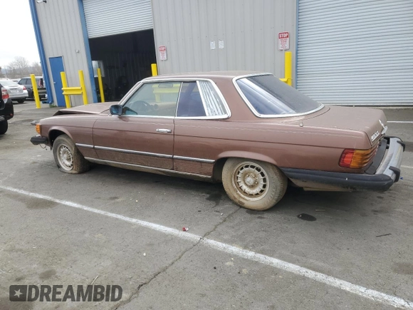 1979 Mercedes-Benz SLC с VIN 10702412025628, выставлен на аукционе Copart как лот 42388515 с пробегом 167 898 миль миль и Списание • Salvage title. История ставок и продаж доступна на DreamBid. Изображение 2.