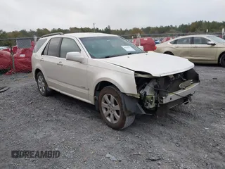 2008 Cadillac SRX RWD z VIN 1GYEE637580123768, wystawiony jako IAAI lot #41802877 z przebiegiem 149 249 mil mil oraz . Historia ofert i sprzedaży dostępna na DreamBid. Obrazek 1.