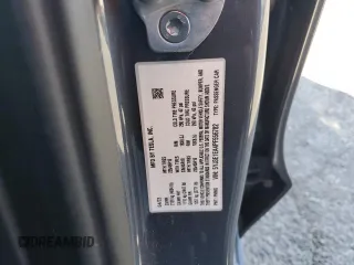2023 Tesla Model 3 with VIN 5YJ3E1EA4PF556782, listed as a Copart auction lot 55626935 with 26,615 mi miles and Salvage title. Bid and sale history available at DreamBid. Image 13.