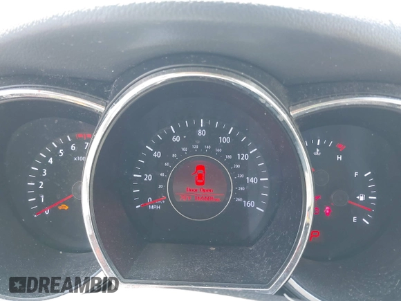2013 Kia Optima EX with VIN 5XXGN4A74DG258769, listed as a IAAI auction lot 42598047 with 165,605 mi miles and . Bid and sale history available at DreamBid. Image 7.