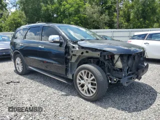 2014 Dodge Durango Citadel with VIN 1C4SDJET1EC349261, listed as a Copart auction lot 61129465 with 201,451 mi miles and Salvage title. Bid and sale history available at DreamBid. Image 4.