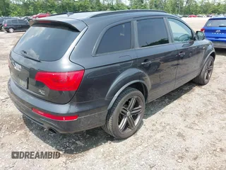 2014 Audi Q7 S line Prestige z VIN WA1DGAFE5ED006957, wystawiony jako IAAI lot #42488440 z przebiegiem 123 814 mil mil oraz . Historia ofert i sprzedaży dostępna na DreamBid. Obrazek 4.