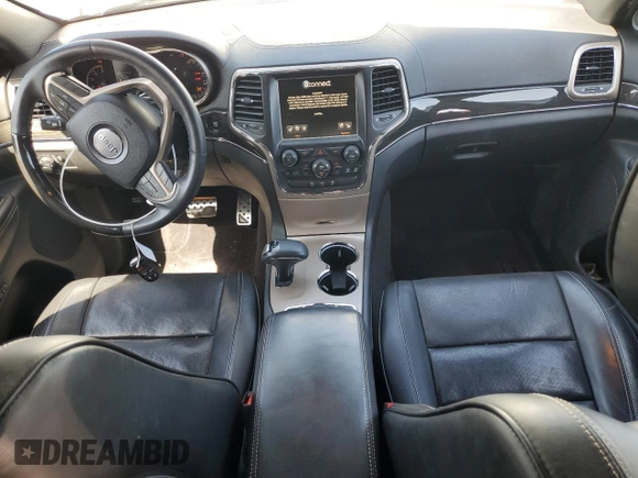 2015 Jeep Grand Cherokee High Altitude с VIN 1C4RJFCM2FC215232, выставлен на аукционе Copart как лот 60002875 с пробегом 122 813 миль миль и Списание • Salvage title. История ставок и продаж доступна на DreamBid. Изображение 8.