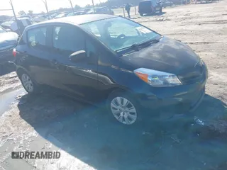 2012 Toyota Yaris L with VIN JTDKTUD33CD504907, listed as a IAAI auction lot 41587510 with 242,307 mi miles. Bid and sale history available at carsss.com. Image 1.
