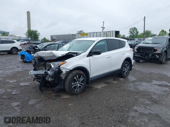 2018 Toyota RAV4 LE with VIN 2T3BFREV7JW851015, listed as a IAAI auction lot 42354042 with 94,603 mi miles and . Bid and sale history available at DreamBid. Image 17.