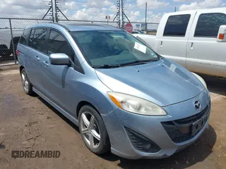 2012 Mazda 5 Grand Touring with VIN JM1CW2DL3C0124571, listed as a IAAI auction lot 42486228 with 192,148 mi miles and . Bid and sale history available at DreamBid. Image 1.